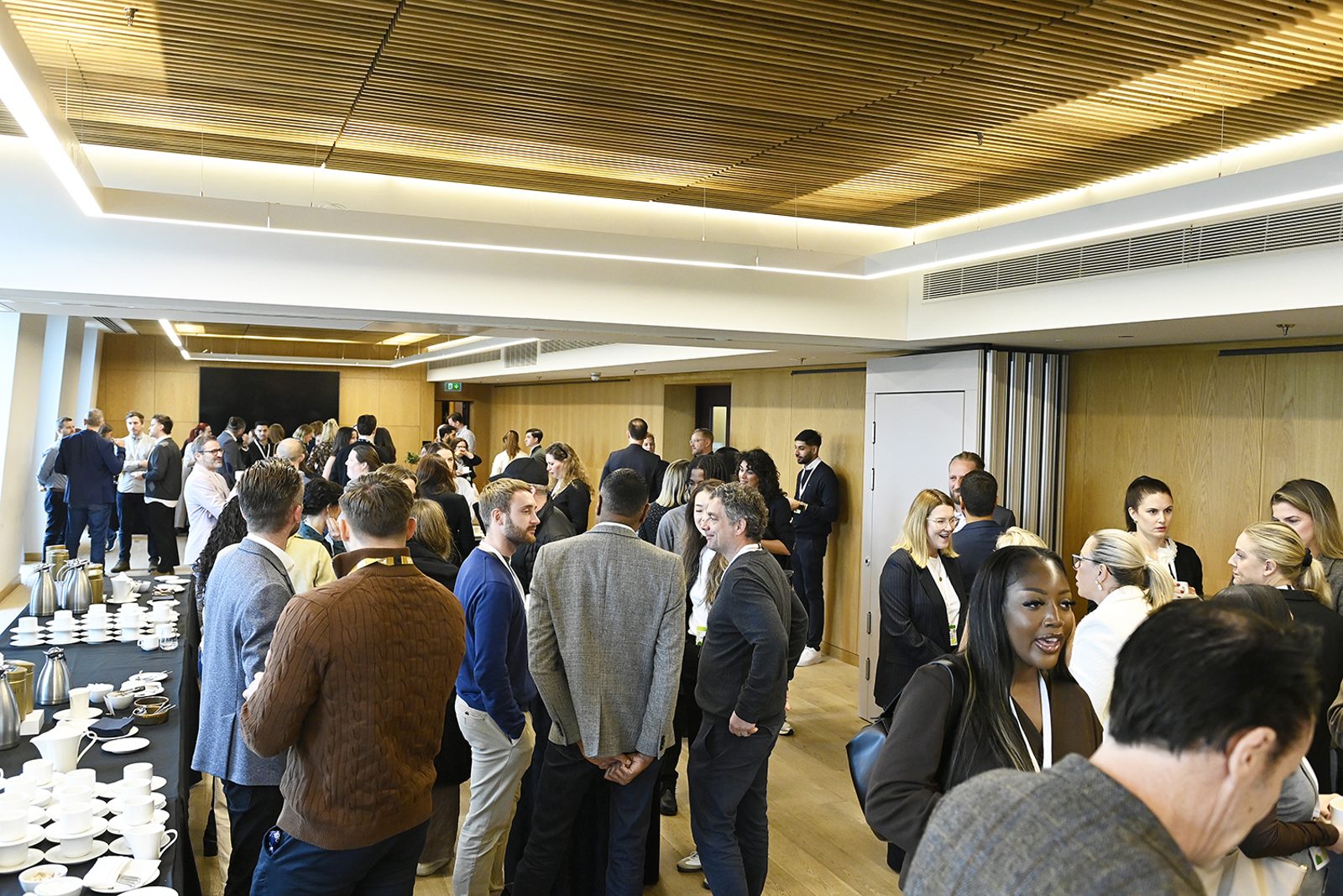 Attendees during a break at the 2025 Forum