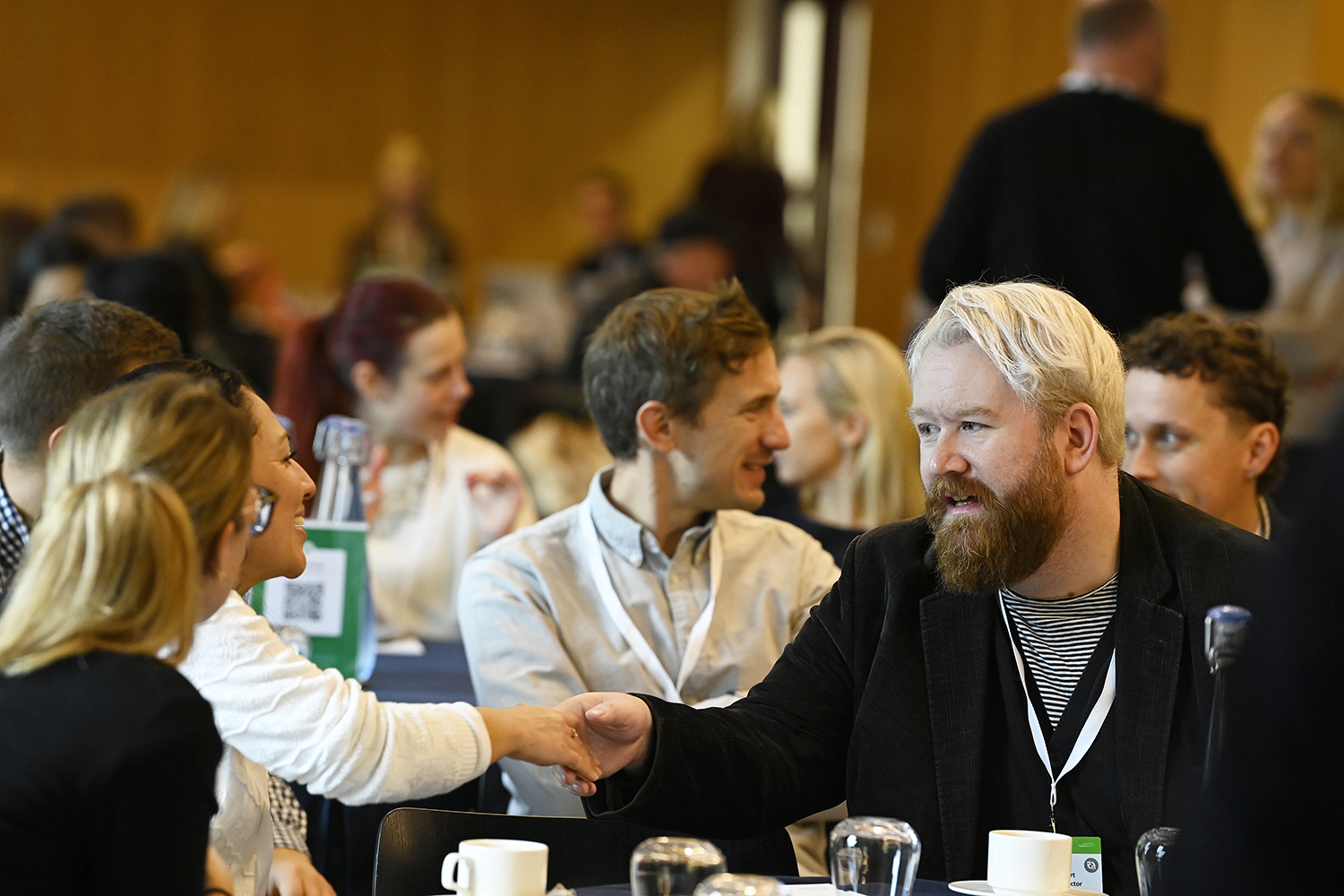 Attendees talking at the 2025 Marketing Forum
